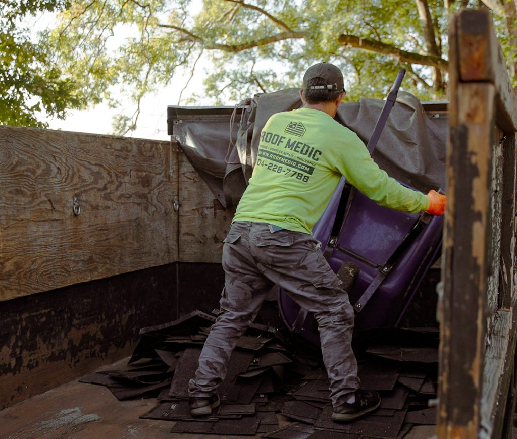 Roof medic worker getting tools and equipment 