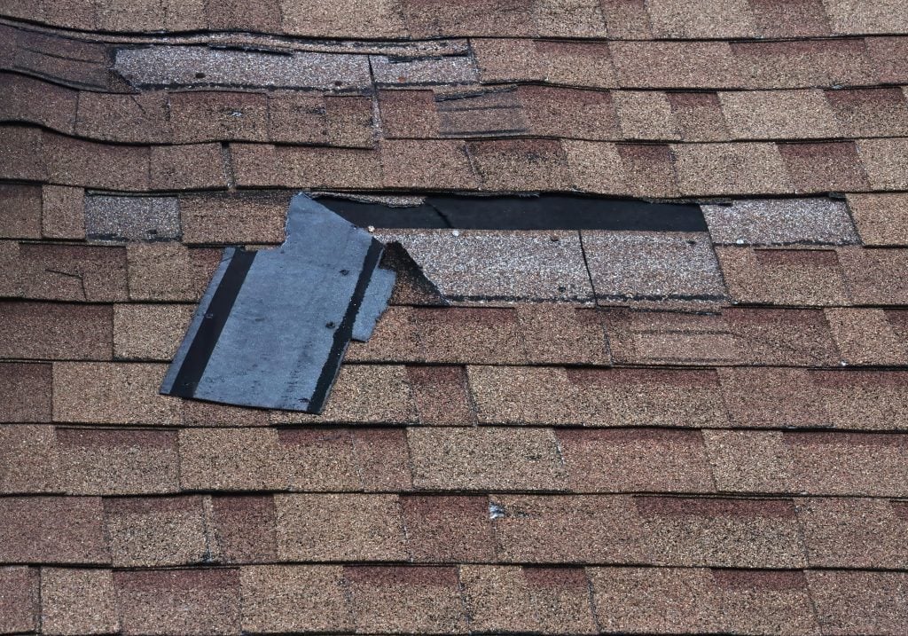 Shingles torn apart by weather