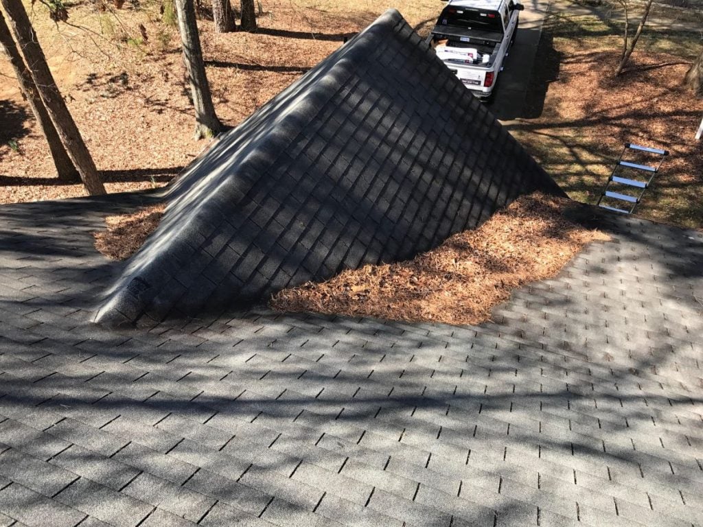 roof debris removal Roof Medic project charcoal roof leaves